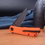 Nóż Składany Real Steel Luna Phantom Flipper 7007OB Liner Lock Blackwash D2 Orange G10 - obrazek 2